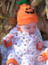 Cousins in a pumpkin patch.