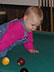 Playing pool.